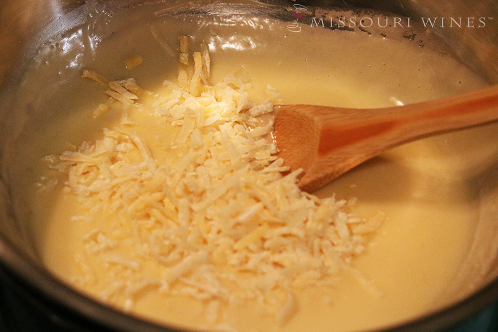 Chardonel Fondue | Coating the cheese in corn starch helps it melt evenly and smoothly.