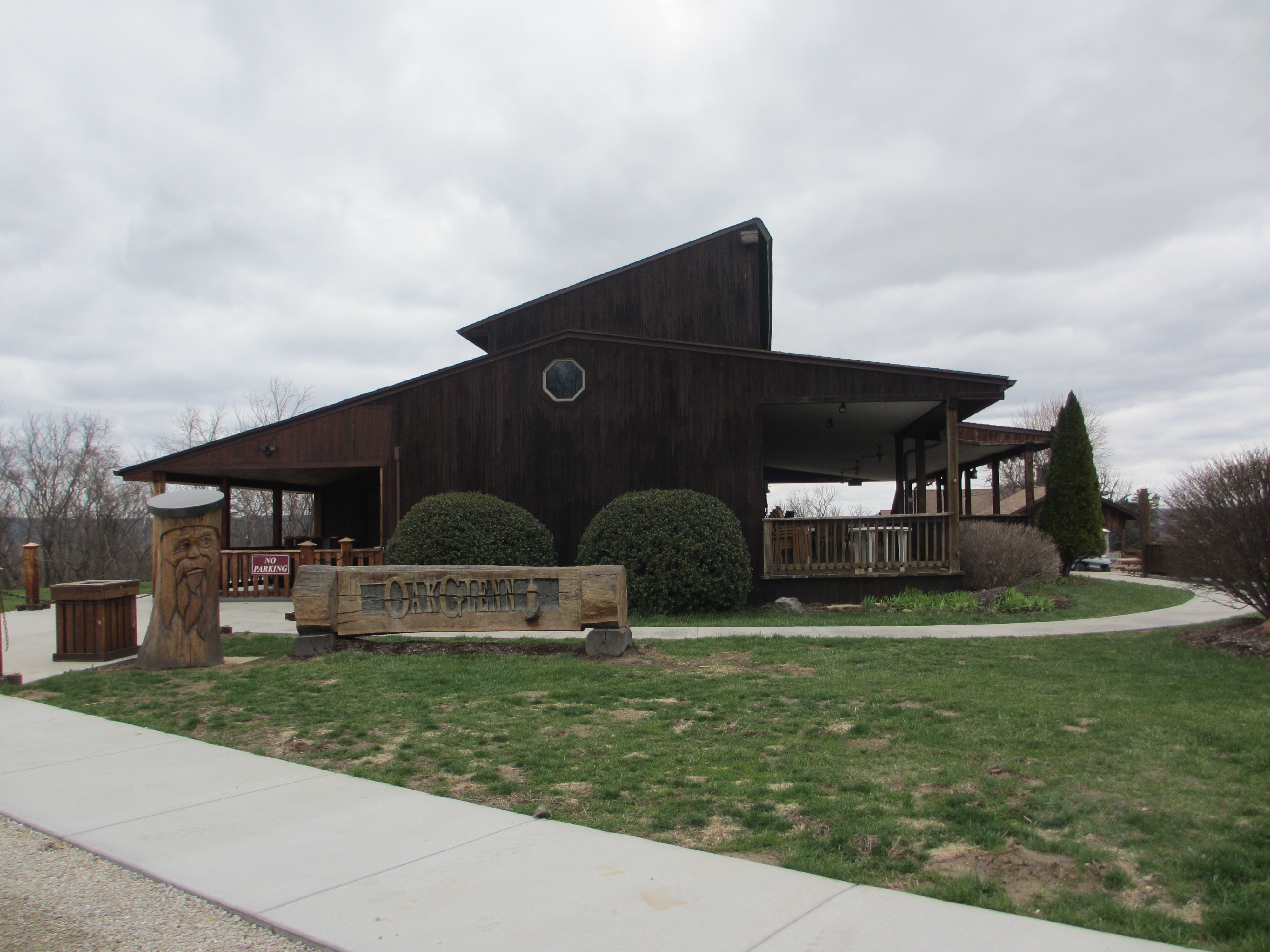 Oak Glenn Winery LLC- Side image of the brown wooden building. There are two decks, one in front and one behind.