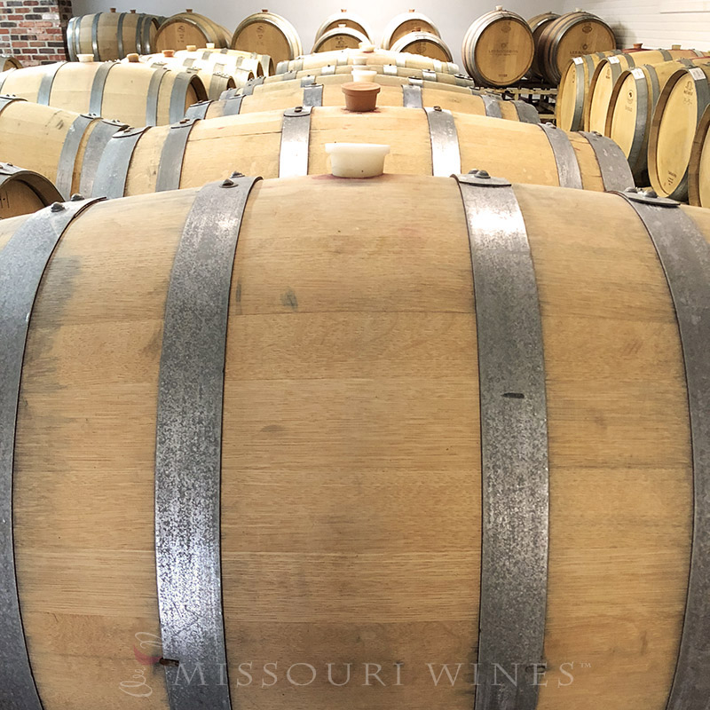 Winter Winemaking in Missouri | A barrel room holds many wines on their way to becoming complex and delicious.