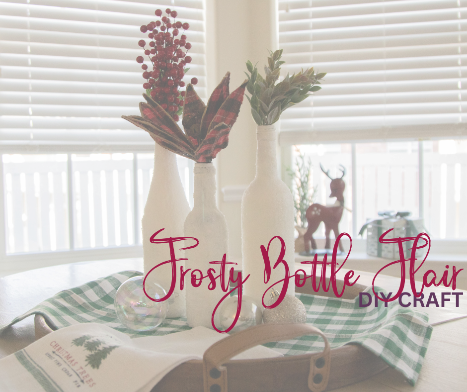 Wine bottles sitting on a table with Christmas decorations 