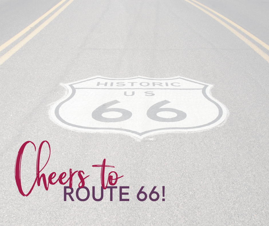 a road with the route 66 road sign stamped on the road with the words cheers to route 66 on the top