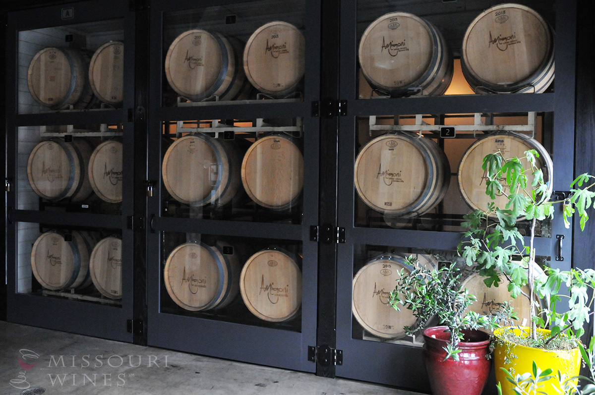 Spotlight on Missouri Wine Country: KC Area | A wall of barrels aging Missouri wine at Amigoni Winery in the West Bottoms.