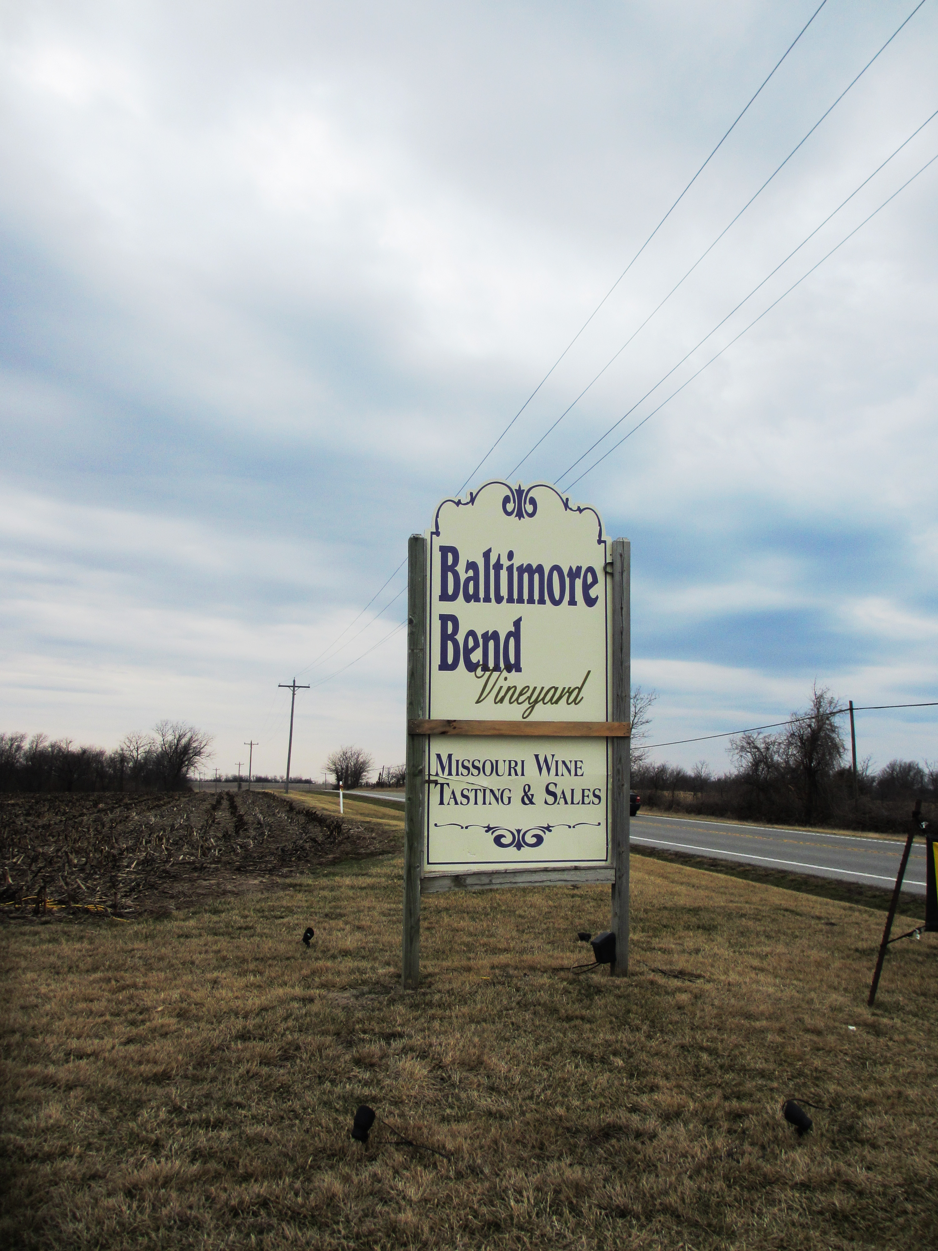Baltimore Bend Vineyard - outdoor photo, daytime, of the winery entrance sign which reads "Baltimore Bend Winery"