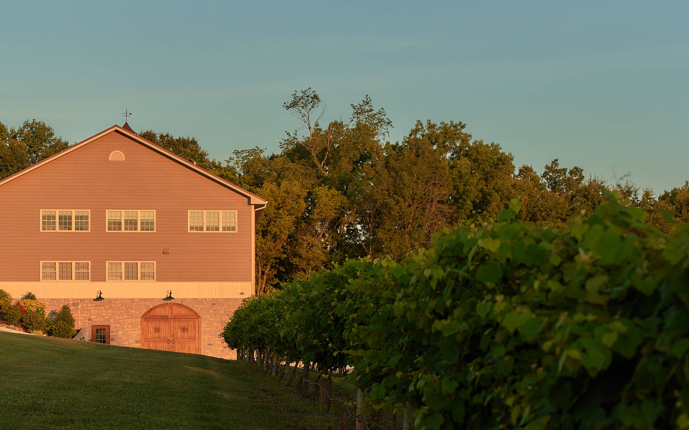 Noboleis Vineyards- Distant shot of winery at sunset.