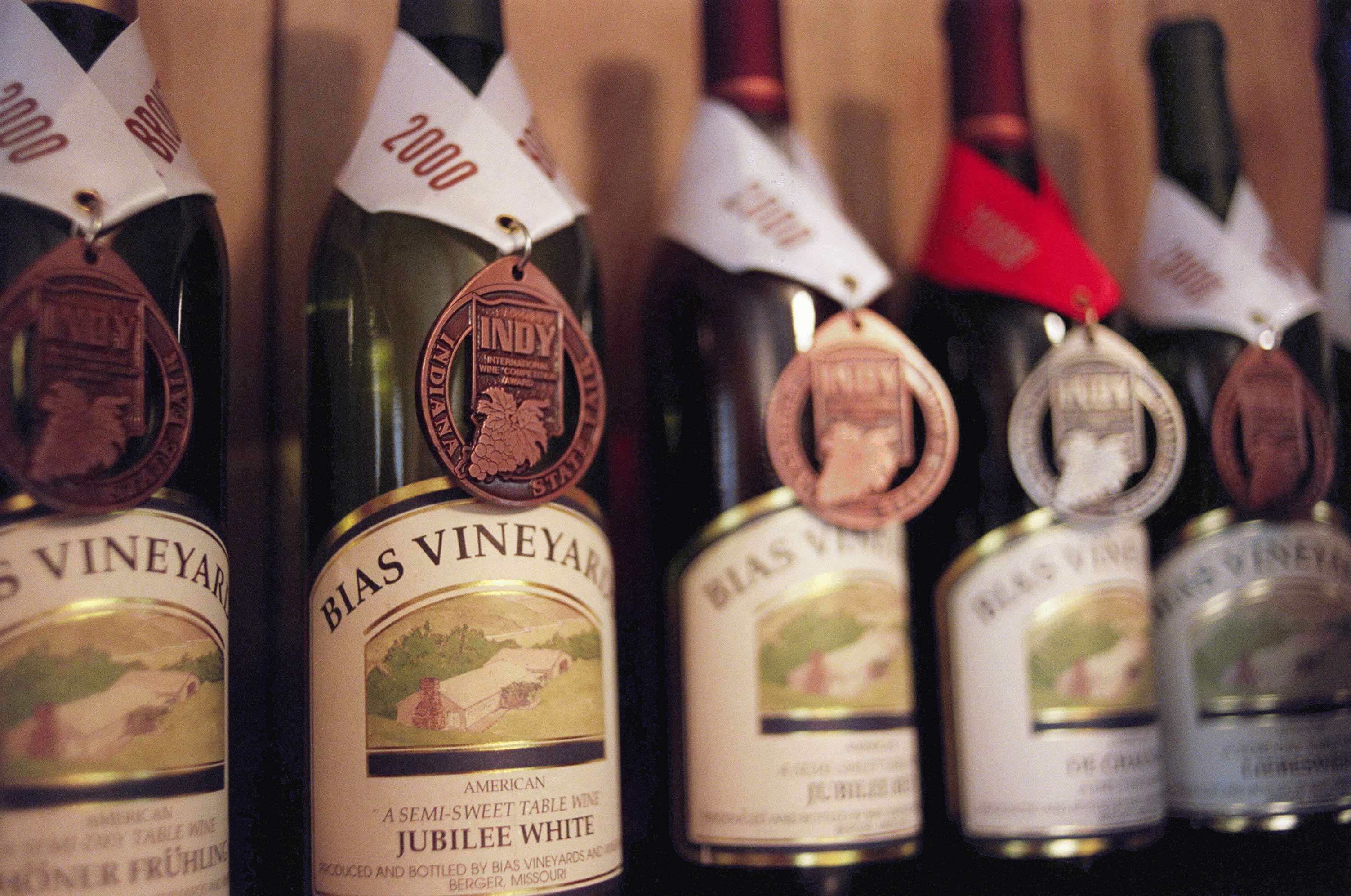 Bias Winery & Gruhlke's Microbrewery - indoor photo, a closeup of several bottles of wine which have awards on them.