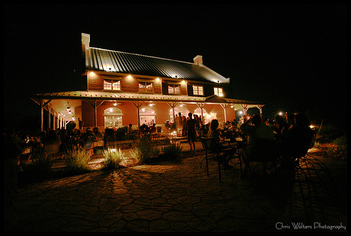 Canterbury Hill Winery and Restaurant - outdoor photo, nighttime, of a large building with several external lights and some landscaping visible.