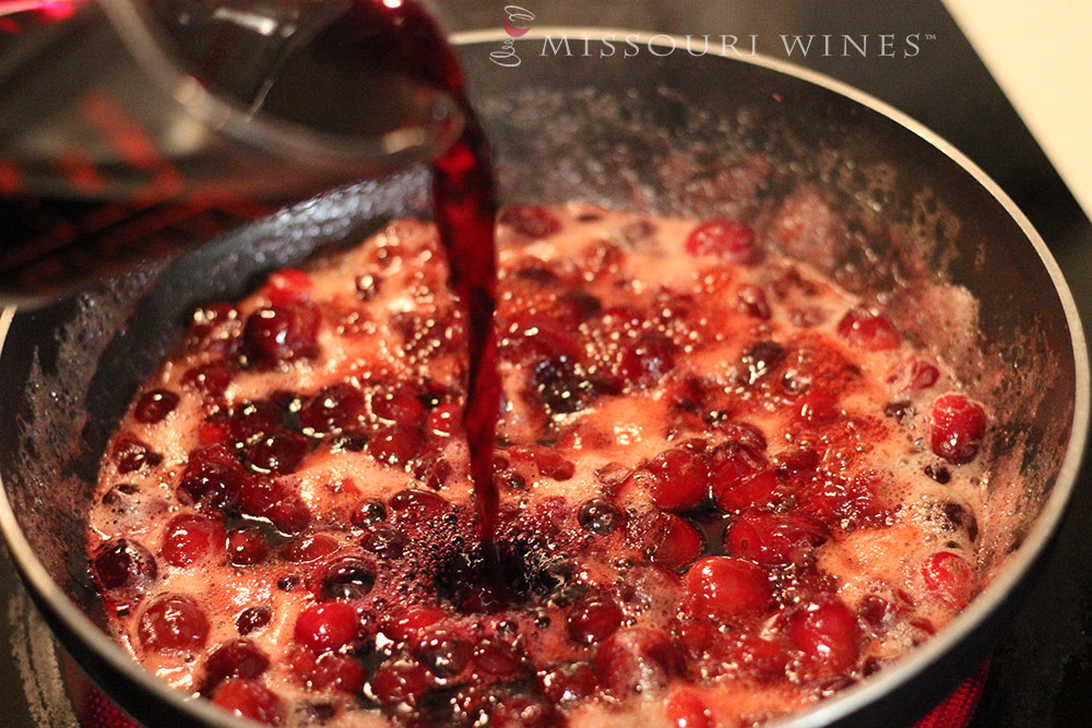 Pouring wine into Chambourcin Cranberry Sauce 