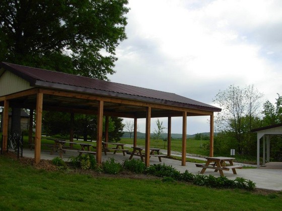 Endless Summer Winery- Covered patio with picnic tables for seating.