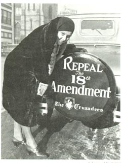 Celebrate Repeal Day with MO Wine- Historic photo of woman posing with a repeal the 18th amendment advertisement 