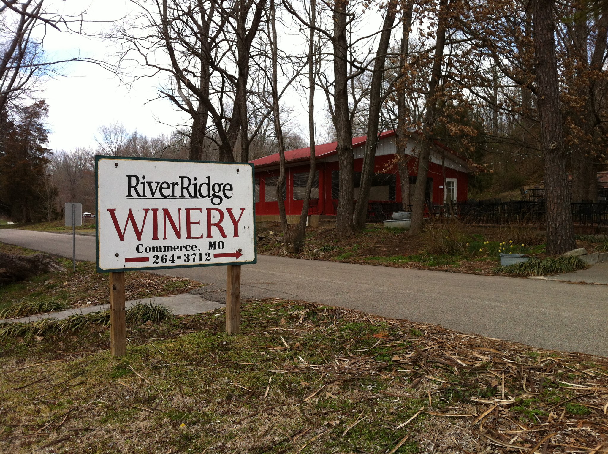 River Ridge Winery - Commerce- Winery sign that reads "River Ridge Winery- Commerce, MO. 264-3712"