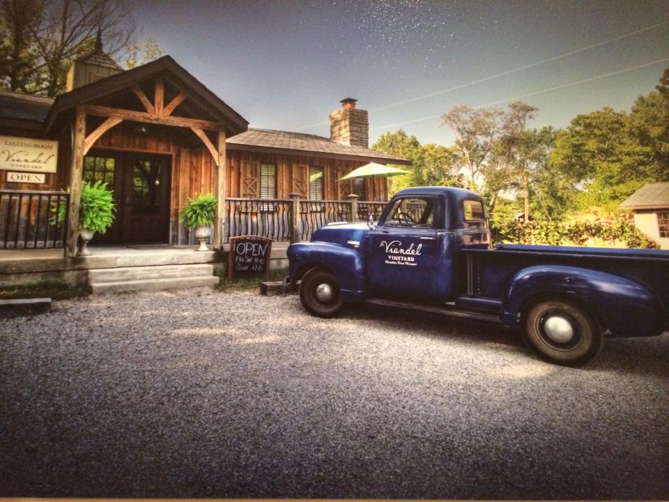 Viandel Vineyard- Outdoor shot of the front door and deck with a vintage blue truck parked in front.