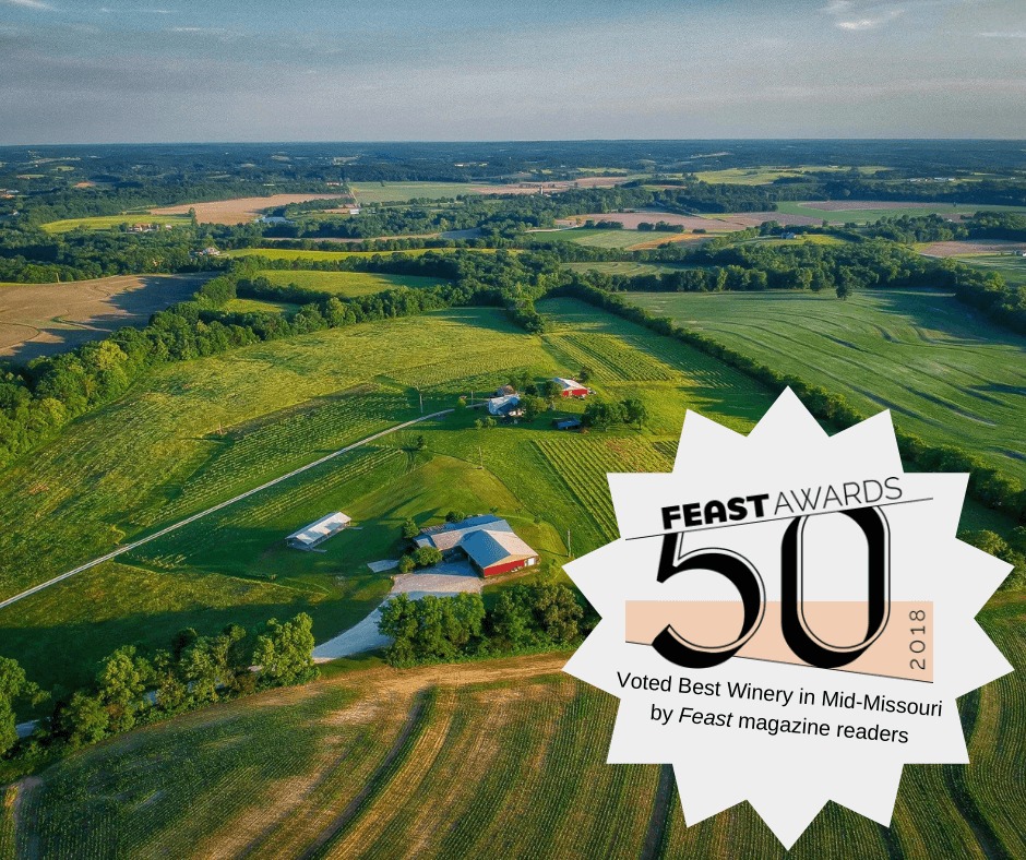 Röbller Vineyard and Winery- Aerial view of winery with a sticker that reads "Feast Awards 50 2018. Voted Best Winery in Mid-Missouri by Feast magazine readers".
