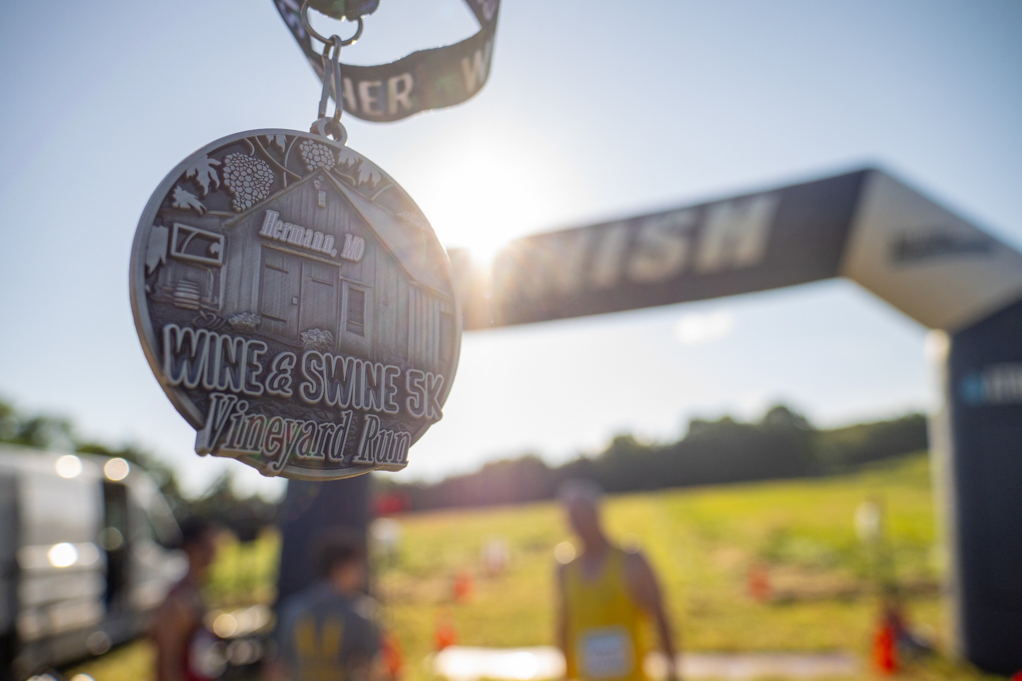 Wine and Swine 5k medal