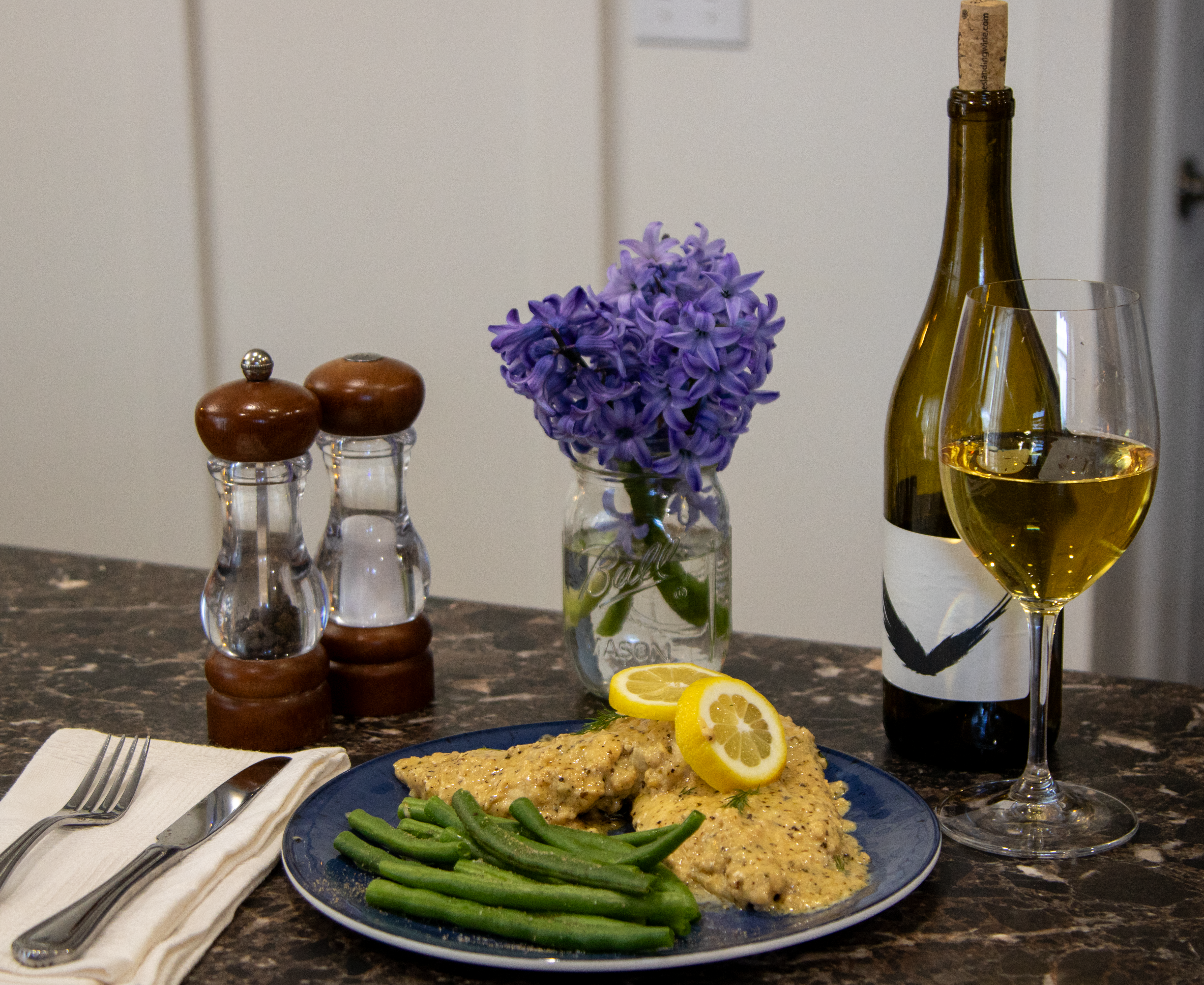 Plated Creamy Chardonel Chicken with wine