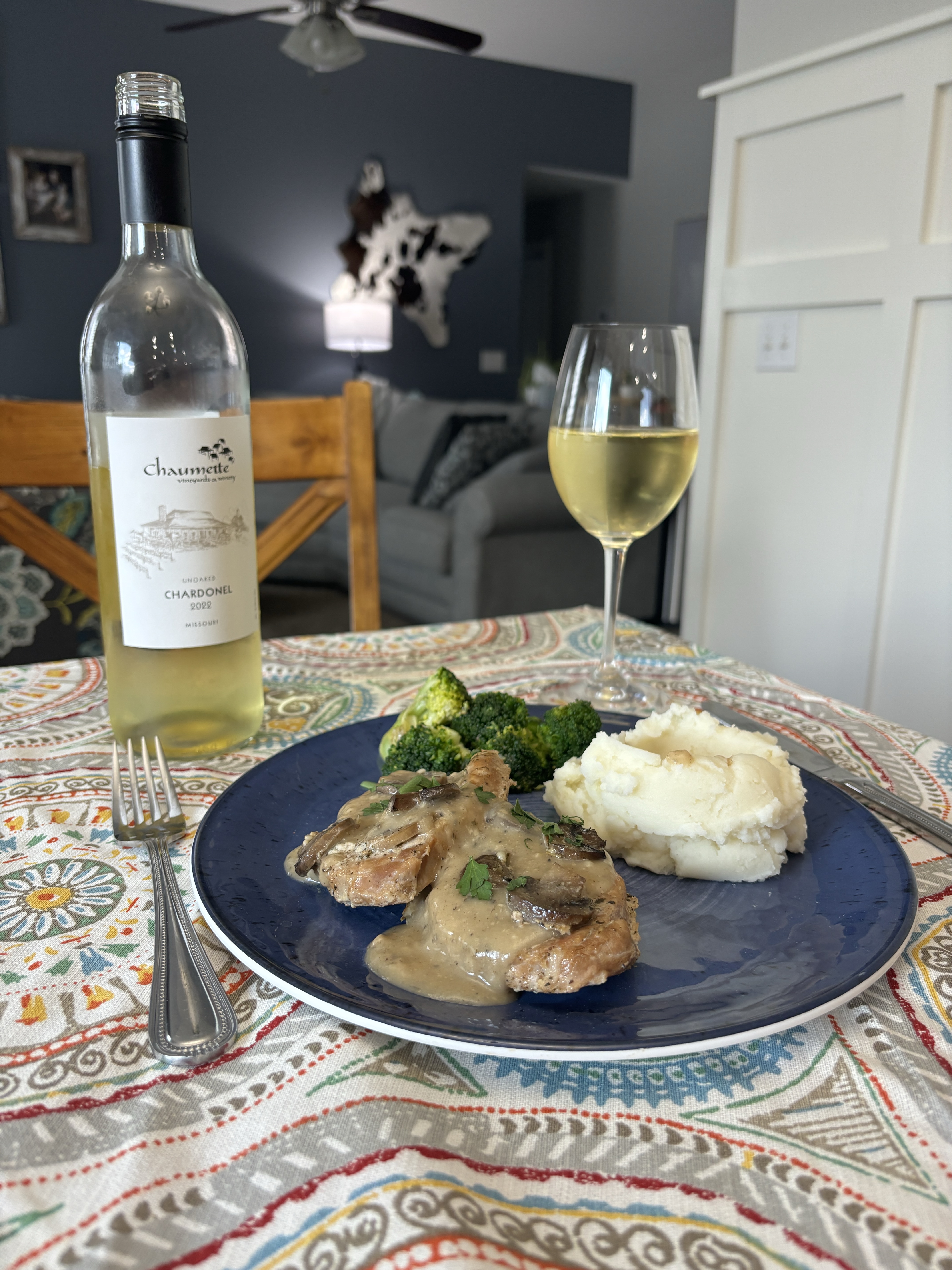 Plated food with a glass of wine