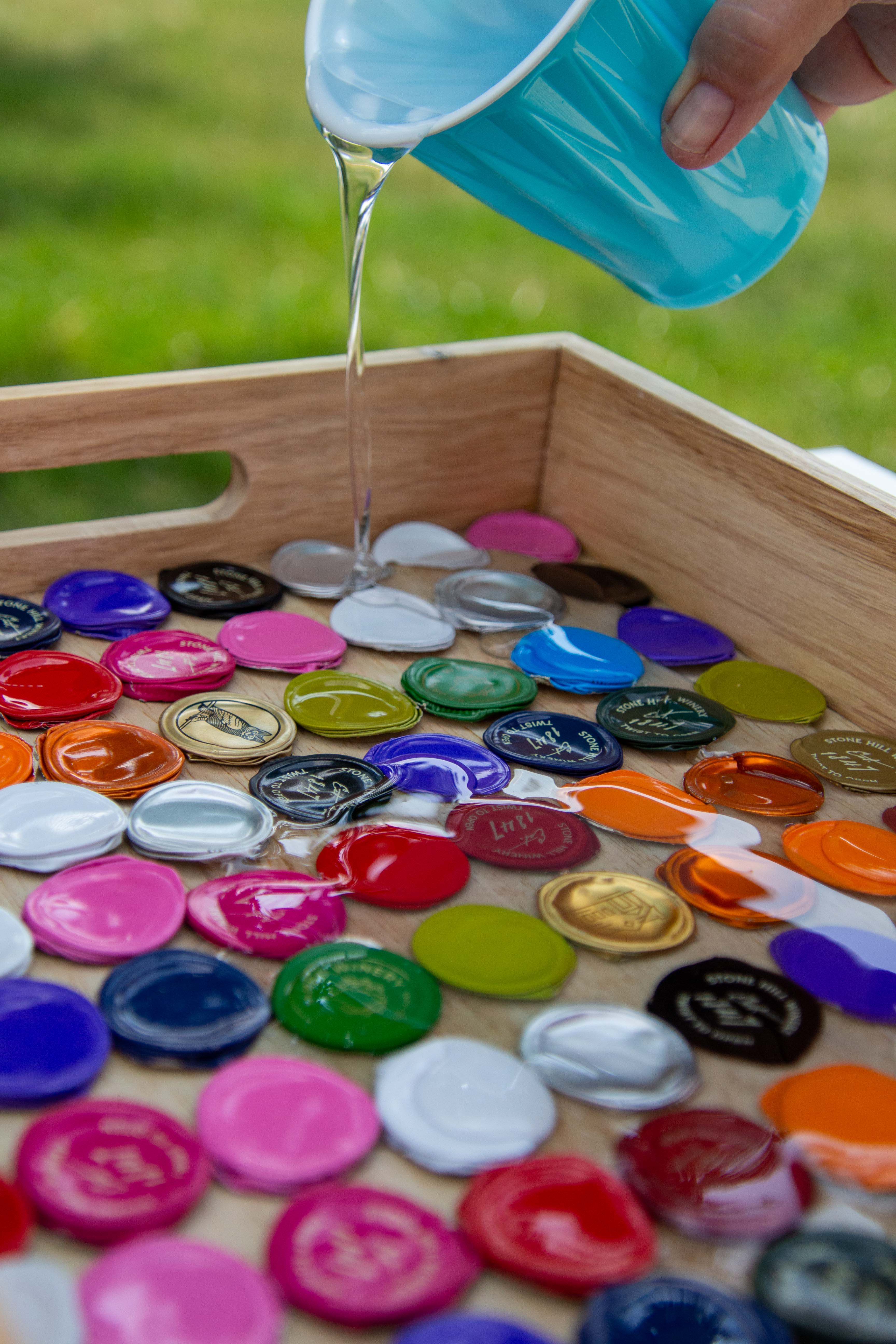Resin poured over bottle caps