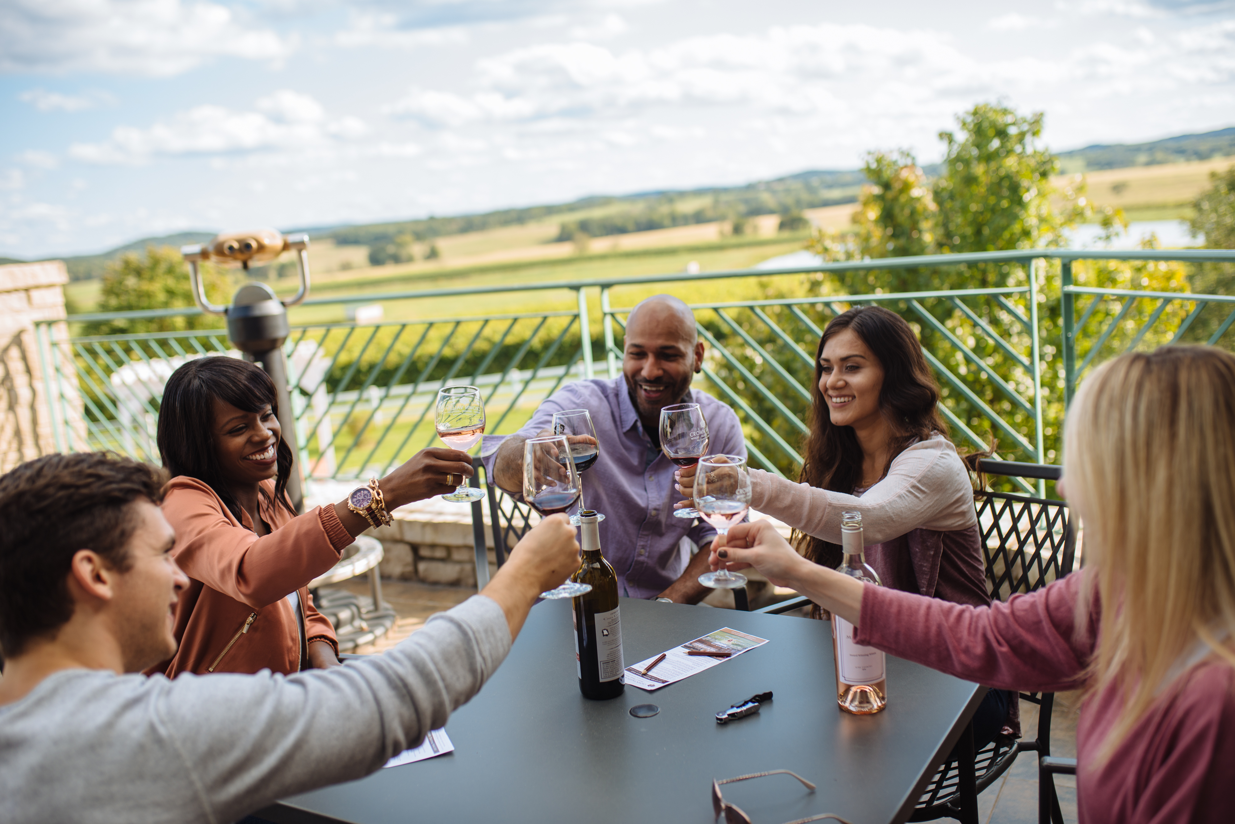Group cheersing at winery