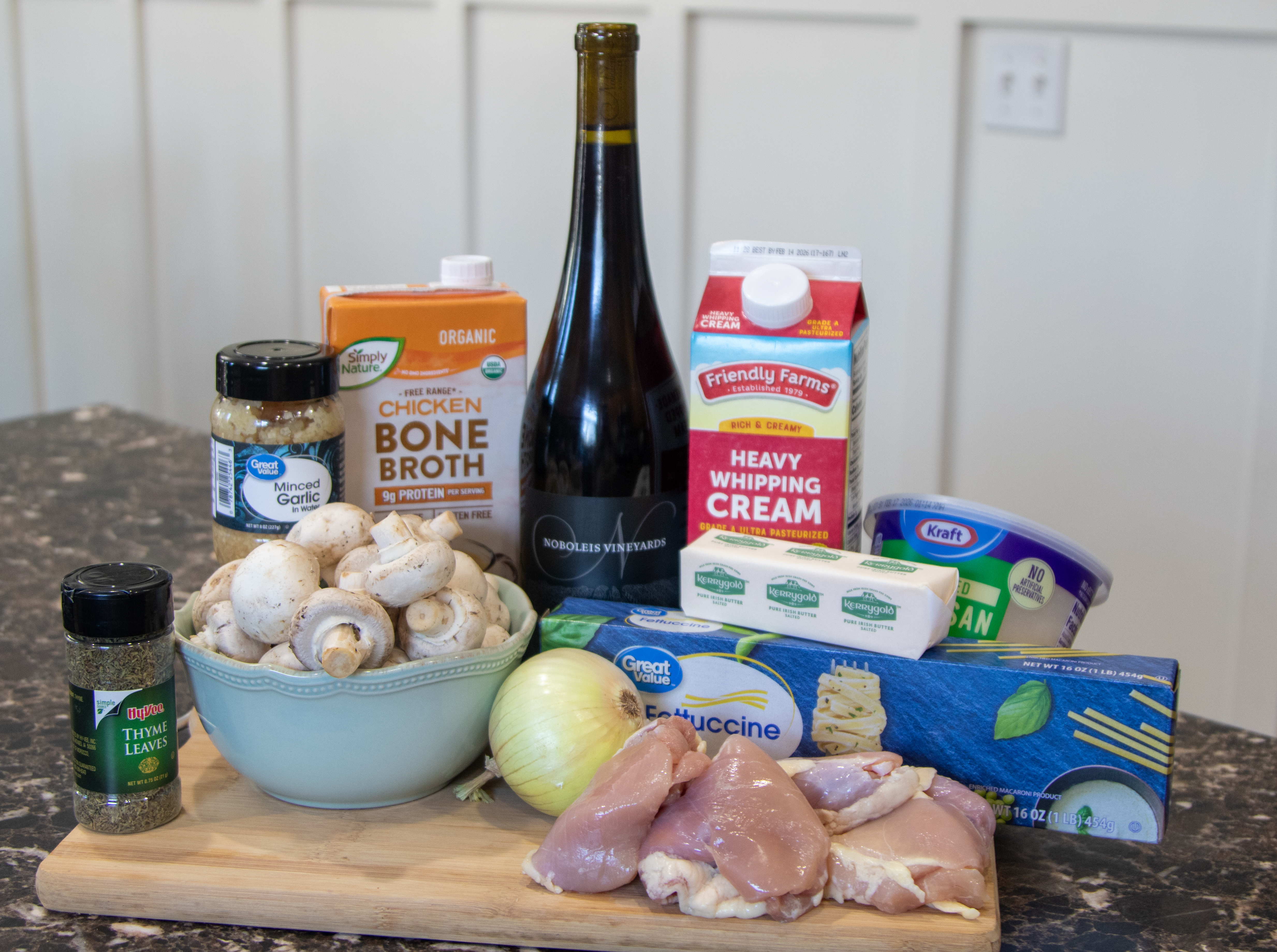a stack of the listed above ingredients for the creamy chicken pasta