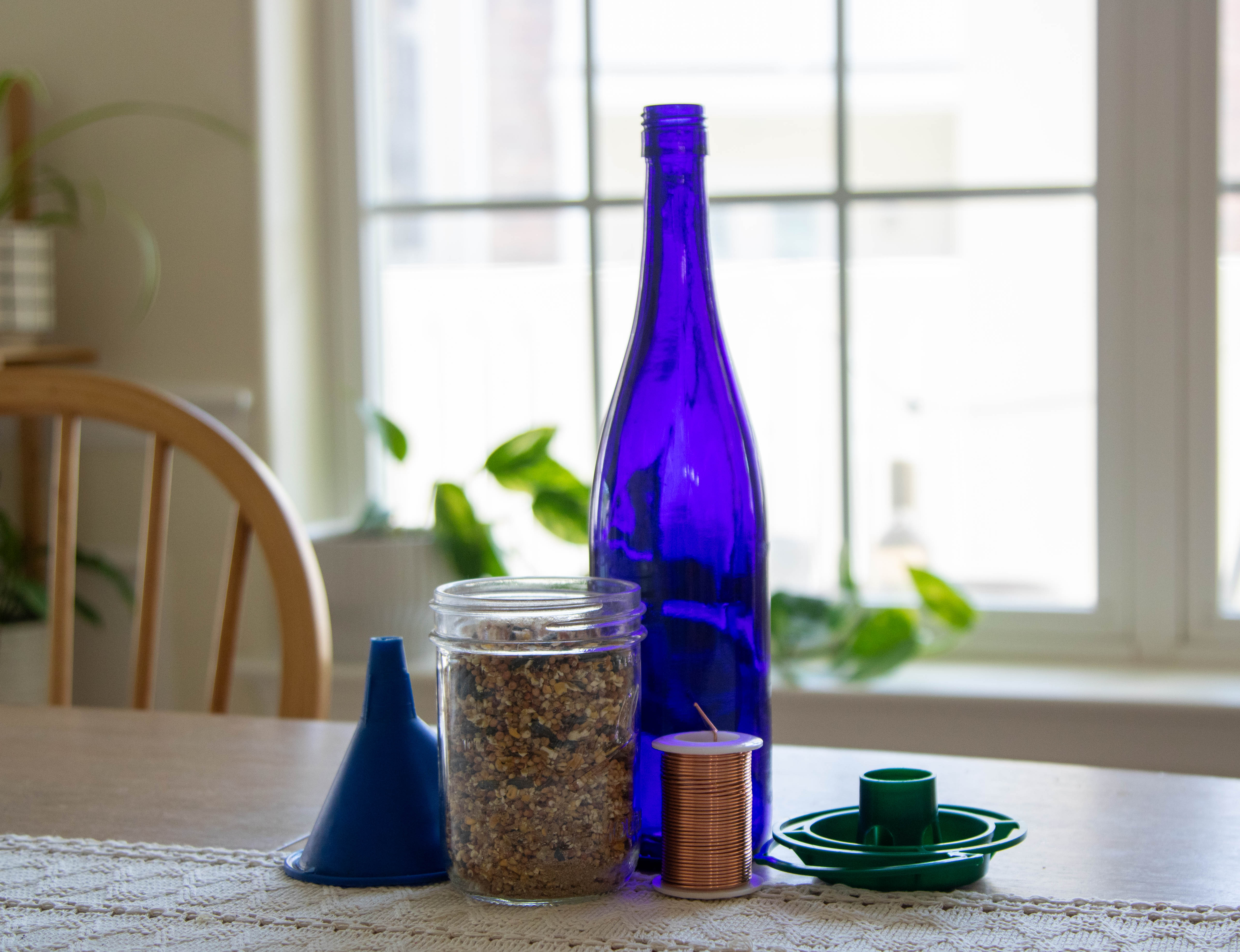 Supplies for wine bottle bird feeder