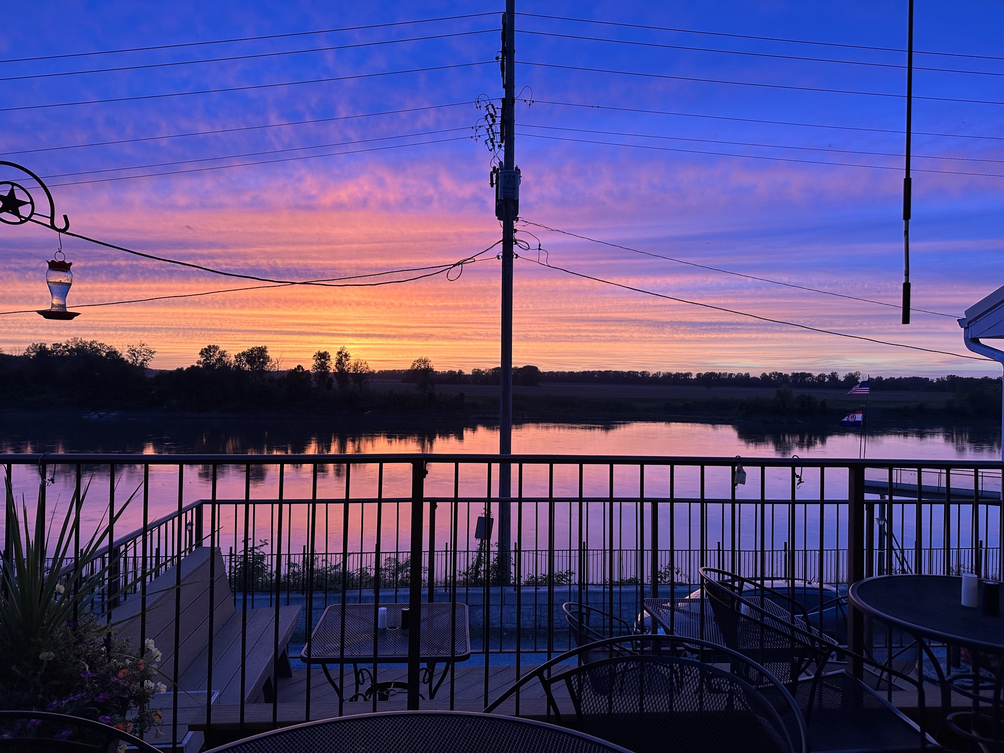 sunset overlooking water