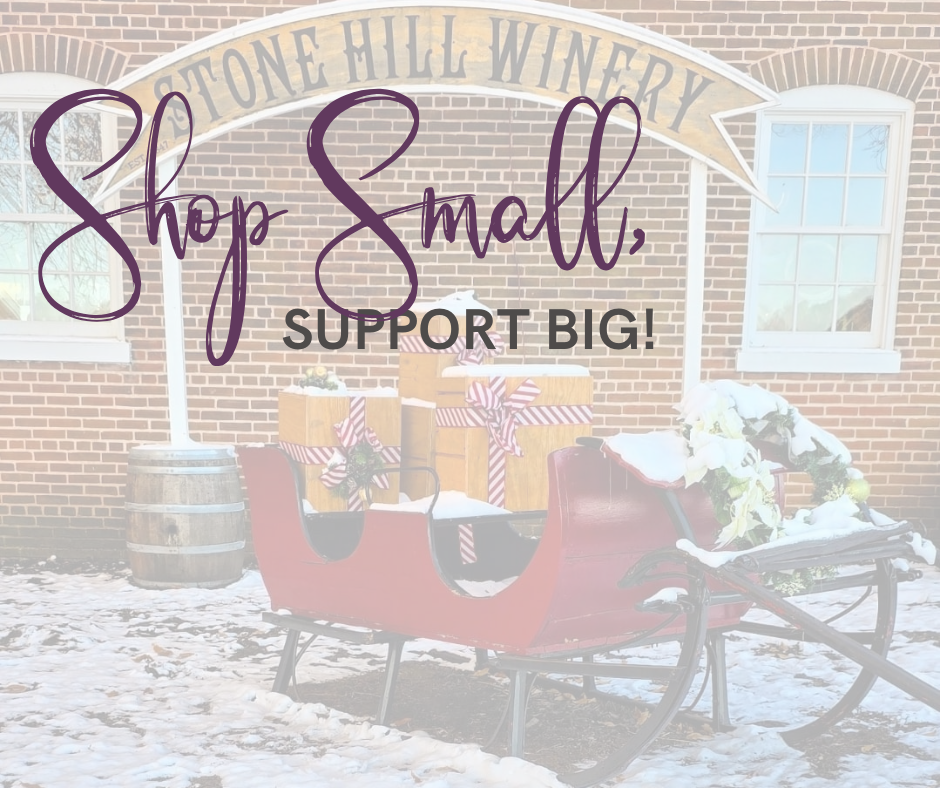 Sleigh full of gifts sitting outside of Stone Hill Winery with text layered over the top!