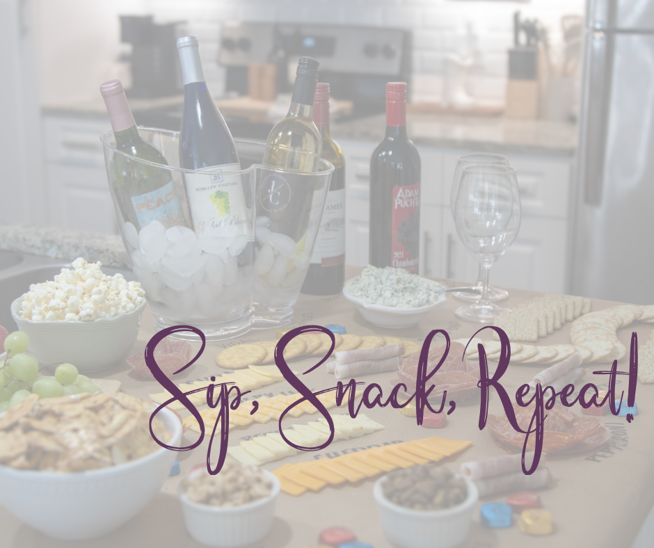 A snack board with a bunch of different snacks sitting out on a countertop with wine to pair. With words layered over the top reading sip, snack, repeat!