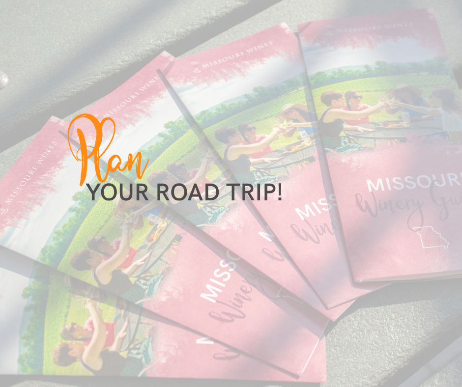 Wine guides stacked and spread out on a picnic table with the words over the top that says plan your road trip!